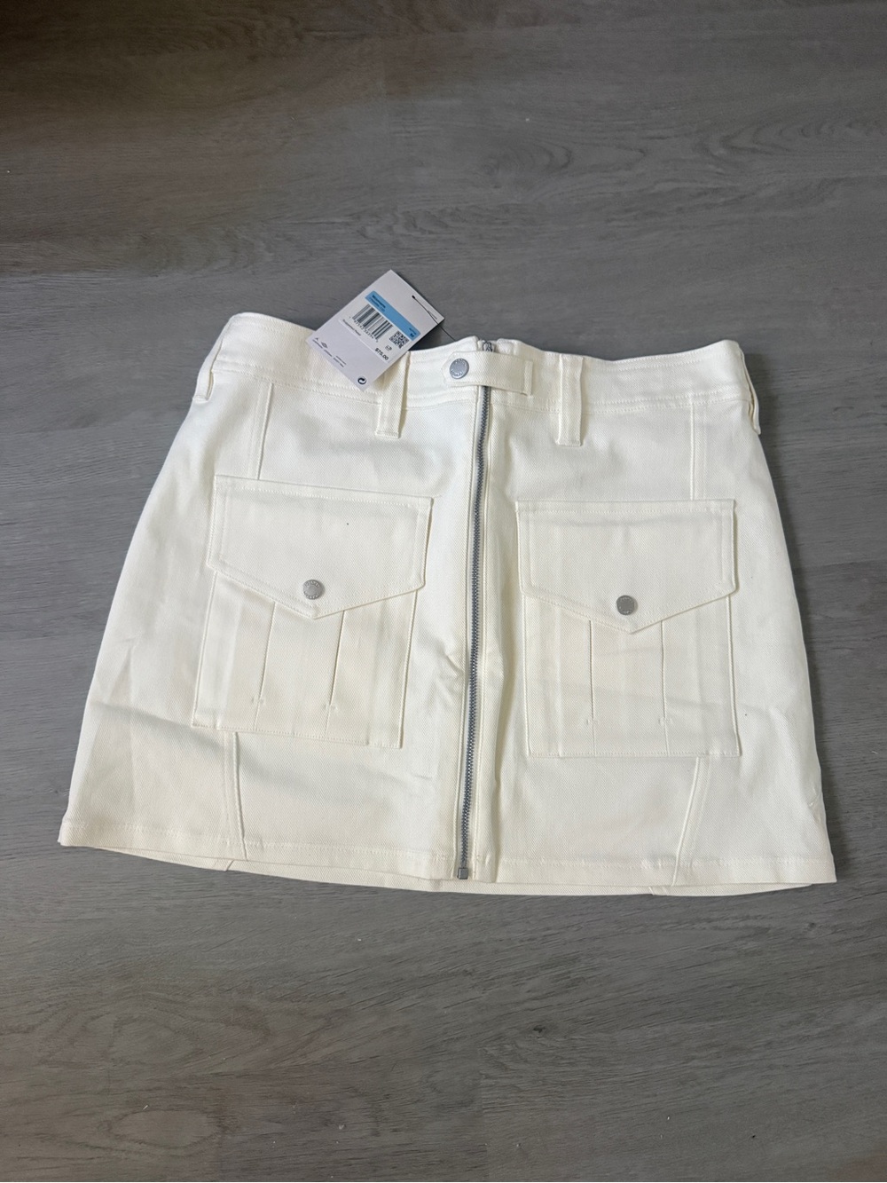 Jordan Cream Elastic-Waist Mini Skirt with Black Logo Tag
